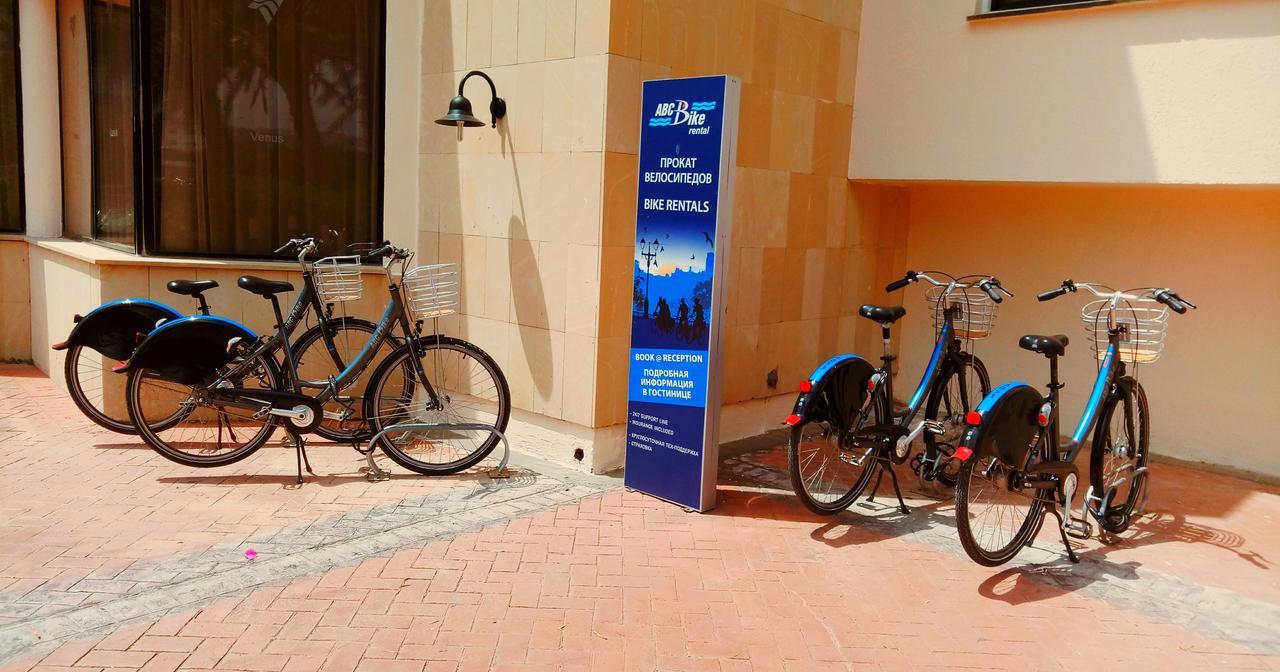 Venus Beach Hotel Paphos Esterno foto Bicycle rental at the airport